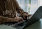 Beginner using ChatGPT on a laptop to learn artificial intelligence and improve productivity